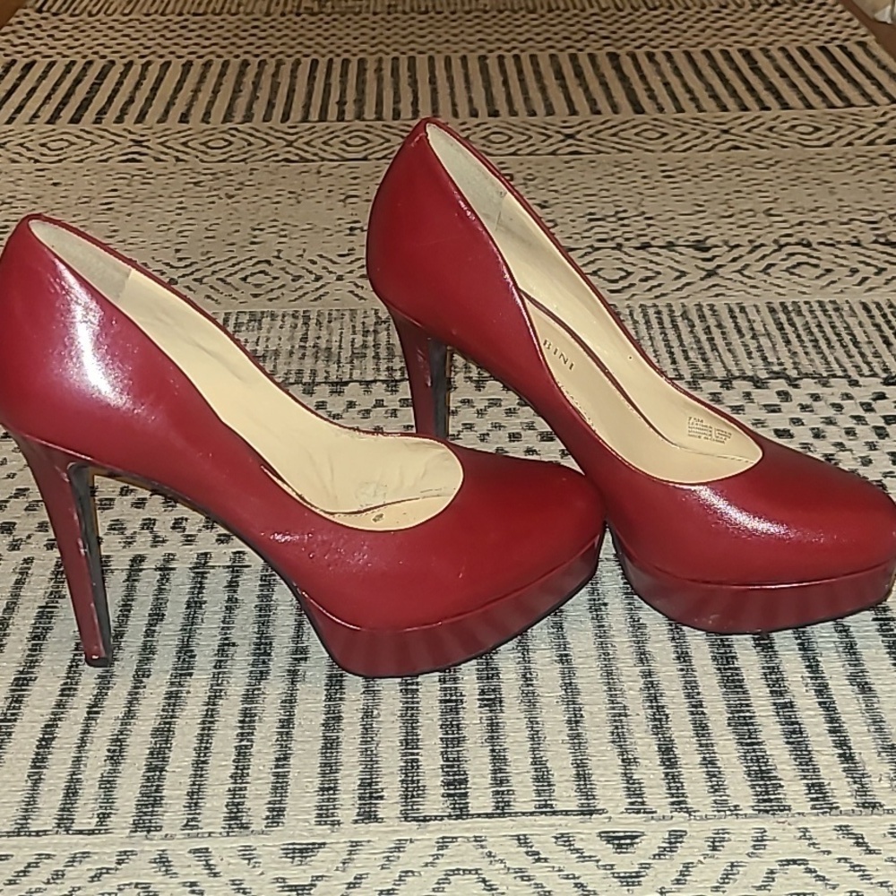 Red platform pumps Gianni lightly worn​​​​​